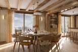 Experience luxury living in this stunning property, featuring a beautifully designed dining area.