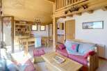 Discover the charm of this cozy chalet, perfect for a mountain getaway.