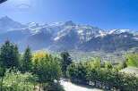 Experience breathtaking mountain views from this stunning property.