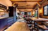 Experience the charm of this stunning property, featuring a rustic wooden ceiling and walls that exude warmth and character.