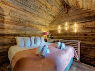 Experience rustic charm in this cozy bedroom.
