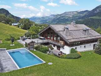Escape to your dream chalet nestled in the heart of the mountains.
