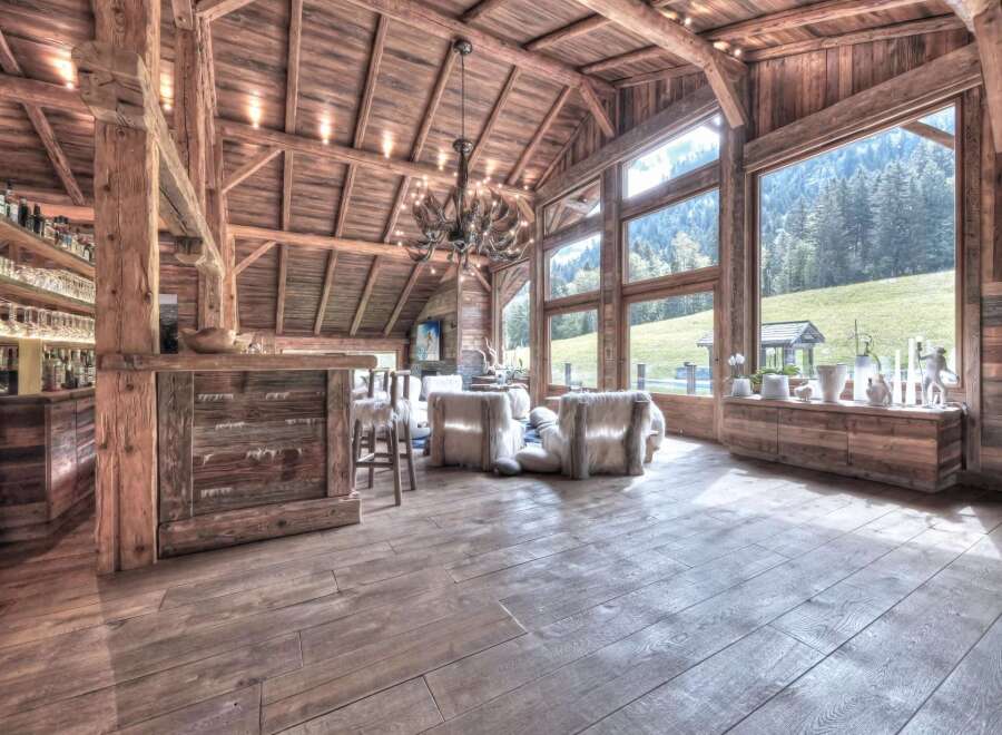 Experience rustic luxury in this stunning chalet-style home.