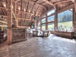 Experience rustic luxury in this stunning chalet-style home.