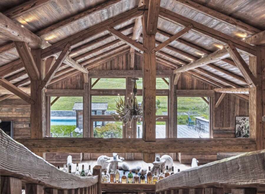 Experience rustic luxury in this stunning timber-framed home.