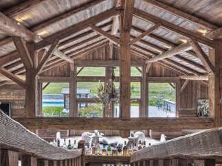 Experience rustic luxury in this stunning timber-framed home.