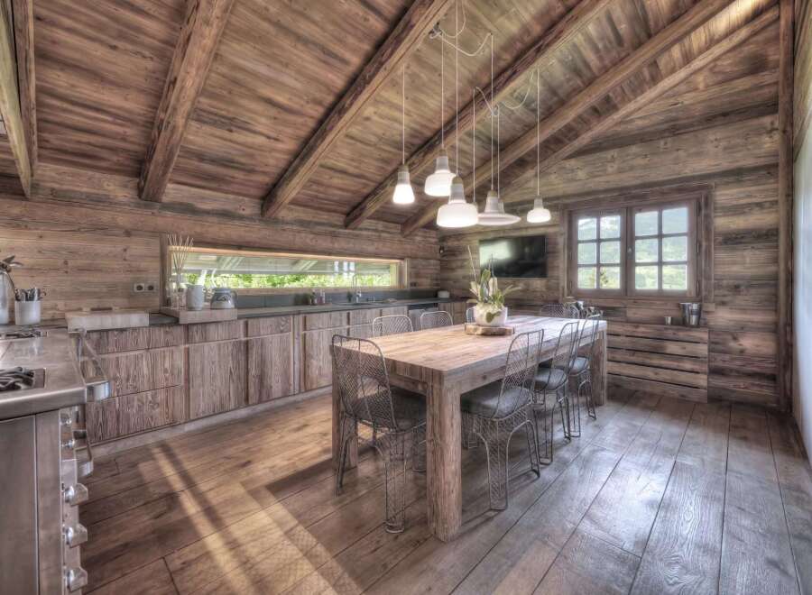 This stunning kitchen boasts a rustic, yet modern design, perfect for those seeking a unique property.