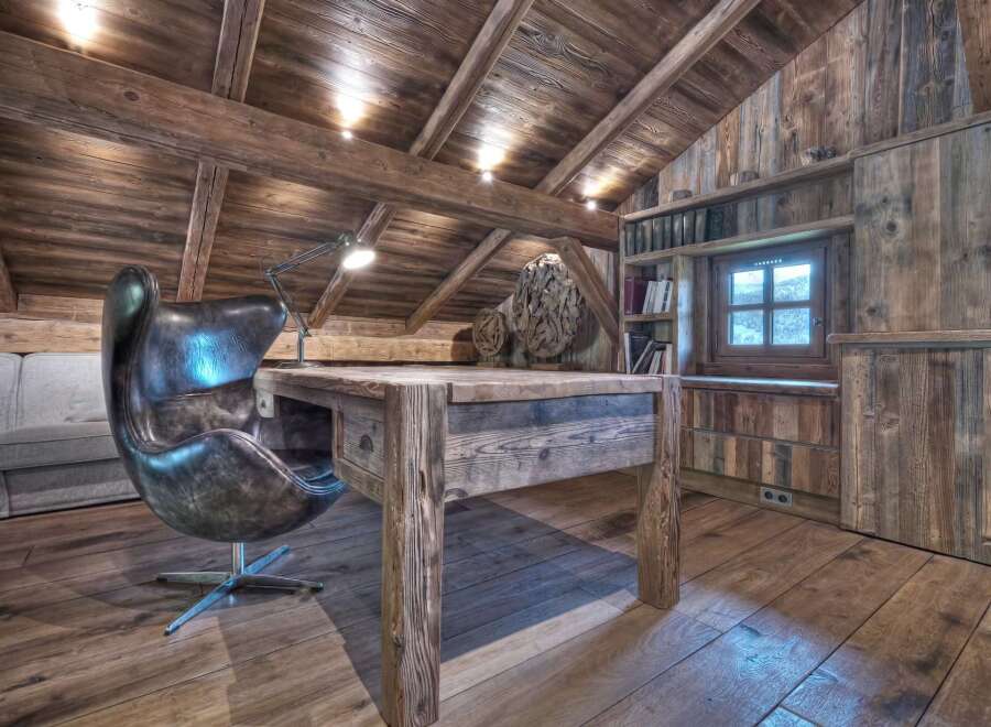Step into rustic elegance with this stunning home office.