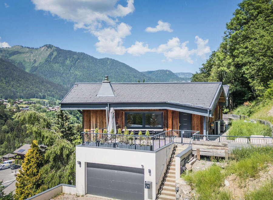 Experience luxury mountain living in this stunning chalet, nestled amidst breathtaking alpine scenery.