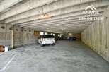 Discover this spacious parking space, perfect for secure vehicle storage.
