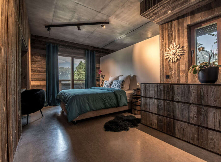 Experience rustic elegance in this stunning bedroom.