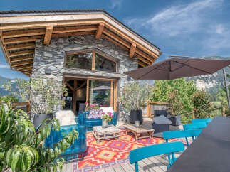 Discover the charm of this stunning property, boasting a unique stone facade and a beautifully designed outdoor space.