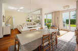 This stunning property boasts a bright and airy dining area, perfect for hosting gatherings.