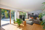 Experience luxury living in this stunning property featuring expansive windows that flood the space with natural light.