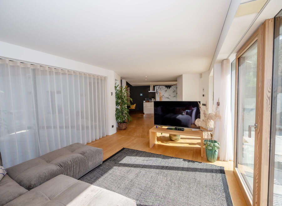 Step into modern elegance with this stunning living space.