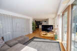 Step into modern elegance with this stunning living space.