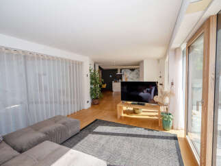 Step into modern elegance with this stunning living space.
