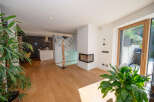 This stunning property boasts a modern open-plan living space with beautiful hardwood floors.