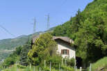 Nestled amidst the serene beauty of the mountains, this charming property offers a tranquil escape.