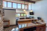 This stunning property boasts a modern kitchen with granite countertops and stainless steel appliances, perfect for culinary enthusiasts.