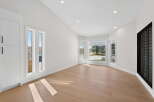 Step into this bright and airy living space, featuring stunning hardwood floors and an abundance of natural light.