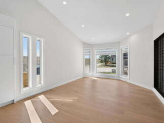 Step into this bright and airy living space, featuring stunning hardwood floors and an abundance of natural light.