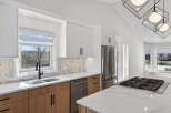 This stunning kitchen boasts modern design elements and high-end finishes.