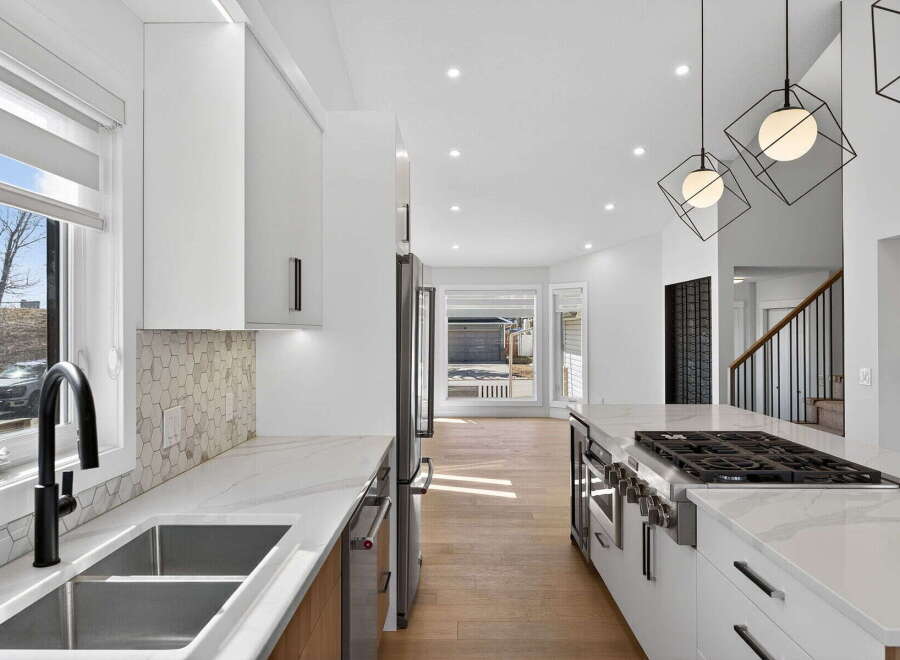 Step into a modern kitchen designed for both style and functionality.