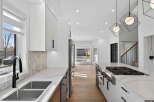 Step into a modern kitchen designed for both style and functionality.
