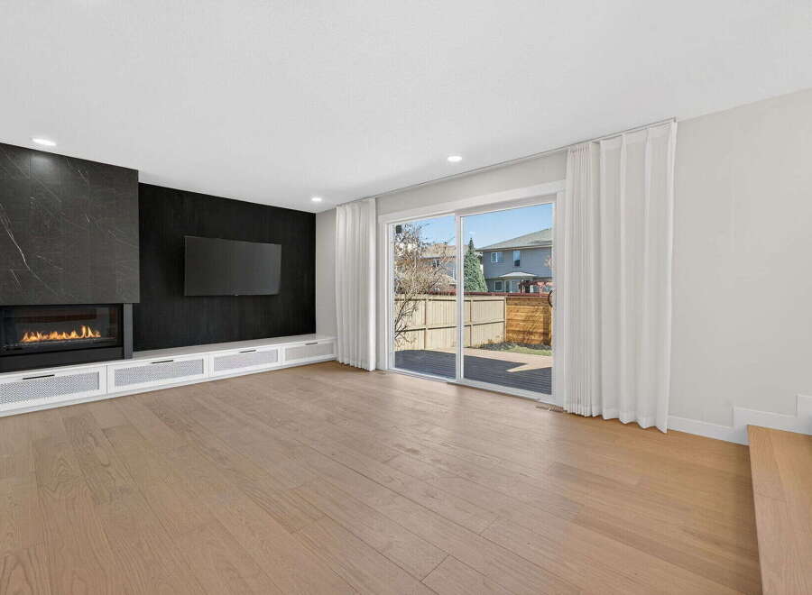 Step into modern luxury with this stunning living space.