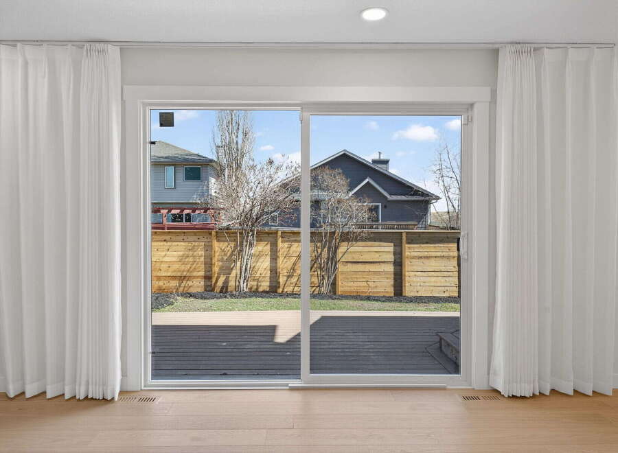 Step into a bright and airy space with this stunning property, featuring expansive windows that flood the interior with natural light.