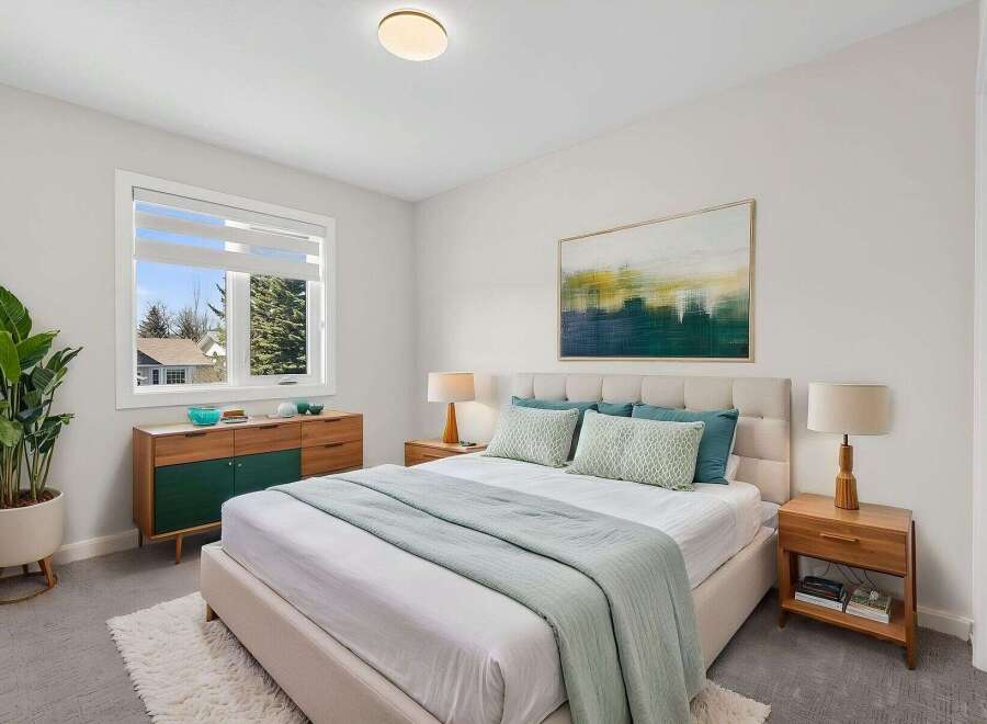 This stunning bedroom offers a serene retreat with its modern design and inviting ambiance.