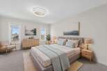 Step into a serene bedroom retreat, designed for ultimate comfort and style.