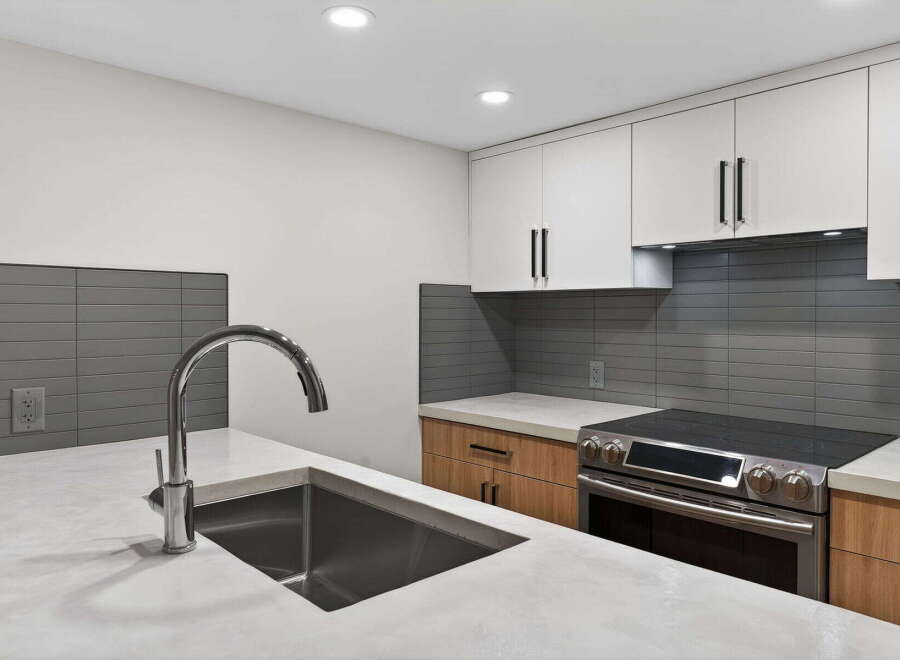 This modern kitchen boasts sleek design elements and high-end appliances.
