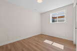 This inviting room features a neutral color palette, creating a versatile space ready for your personal touch.