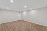 Step into this inviting space, featuring a bright and airy interior with neutral walls and modern recessed lighting.