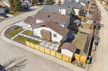 This stunning property boasts a modern design with a beautifully landscaped front yard and a private backyard oasis.