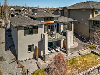 This stunning modern home boasts a sleek design and luxurious features.