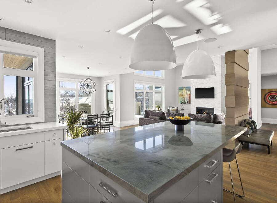 This stunning kitchen boasts a modern design with a large island, perfect for entertaining.