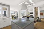 This stunning kitchen boasts a modern design with a large island, perfect for entertaining.