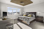 Step into luxury with this stunning bedroom, featuring a modern design and ample natural light.