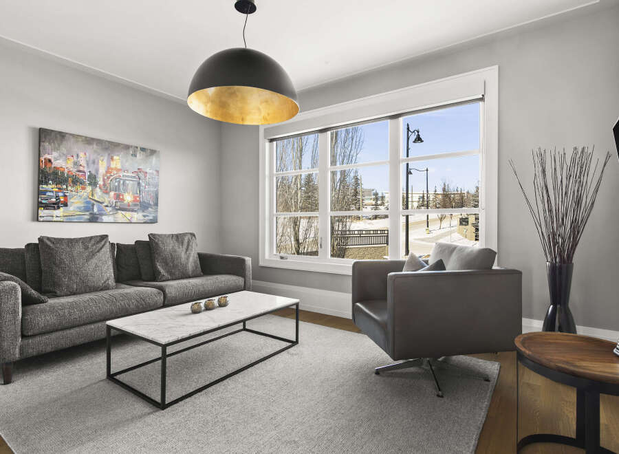 This stunning living room boasts a modern design with a touch of elegance.