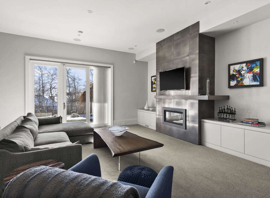 This stunning living room features a modern fireplace, perfect for cozy evenings.