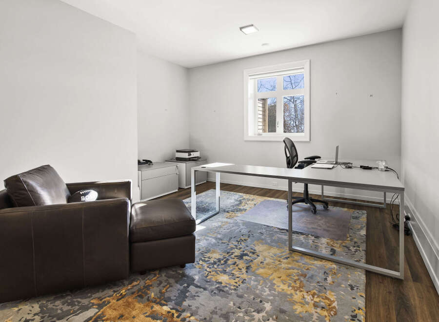 This modern office space offers a sleek and functional design, perfect for productivity.