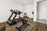 This home gym offers a dedicated space for fitness enthusiasts.