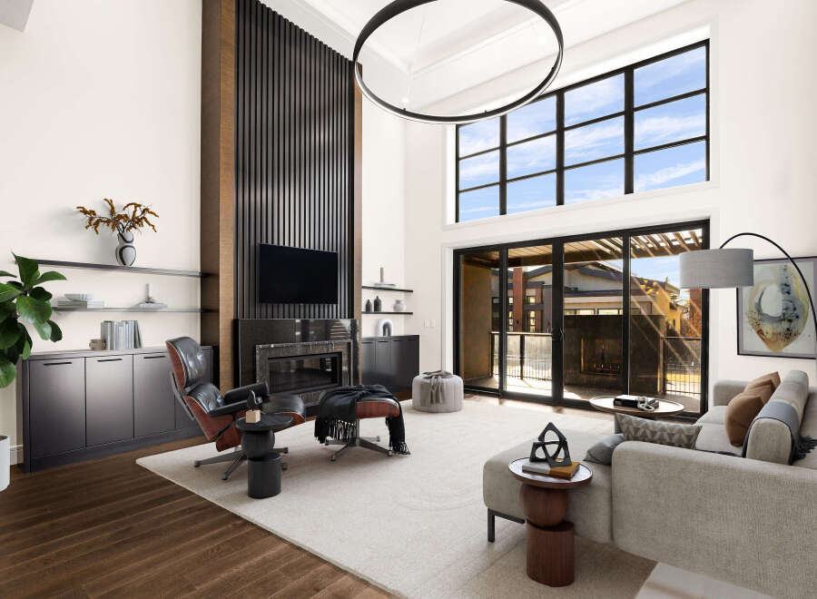 Experience luxury living in this stunning property, featuring a modern design with high ceilings and expansive windows that flood the space with natural light.