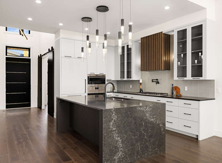 This stunning kitchen boasts modern design and high-end finishes.