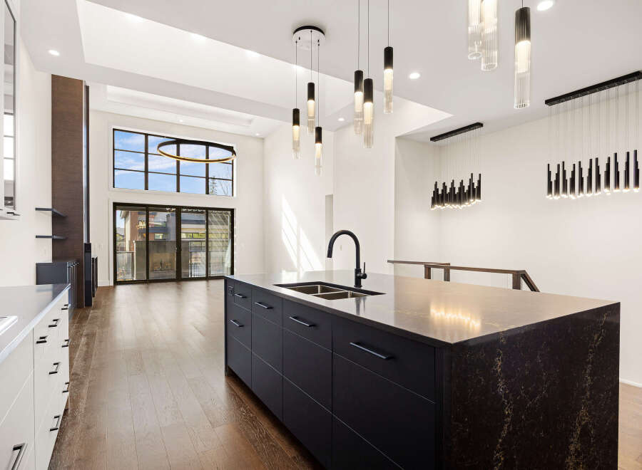 Experience luxury living in this stunning modern kitchen.