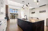 Experience luxury living in this stunning modern kitchen.