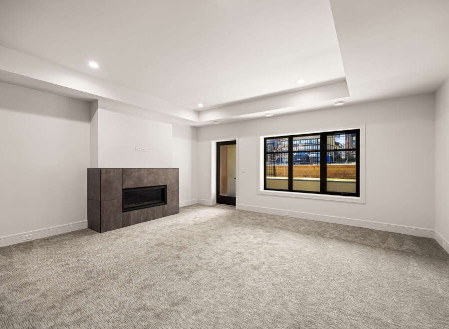 This stunning property boasts a modern fireplace, perfect for cozy evenings.